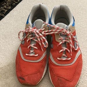 Men’s New Balance shoes - black smudge on right toe.